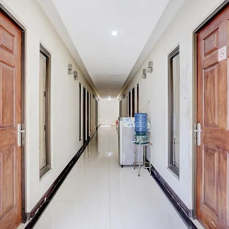 Oyo Life 90606 Glass House Citraland Syariah-3